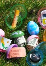 Camo Eggs and Jumbo Eggs for the Adults - Who say's you're too old to hunt? Pictured left to right: Coins, Stickers, Movie Ticket coupon, $5 bill, Burt's Bees Chapstick, $1 bill, Facial Cream from the Body Shop, Pedometer.
