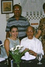 Me, my grandfather and his relatives. In 1998 I took my first trip to PI (Philippines) to celebrate my grandfather's 98th birthday, meet extended family, and learn more about the amazing man my Grandfather was.
