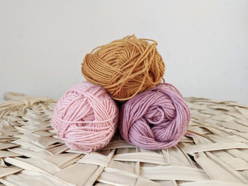 Montessori Elementary School quiet time activities: Yarn weaving